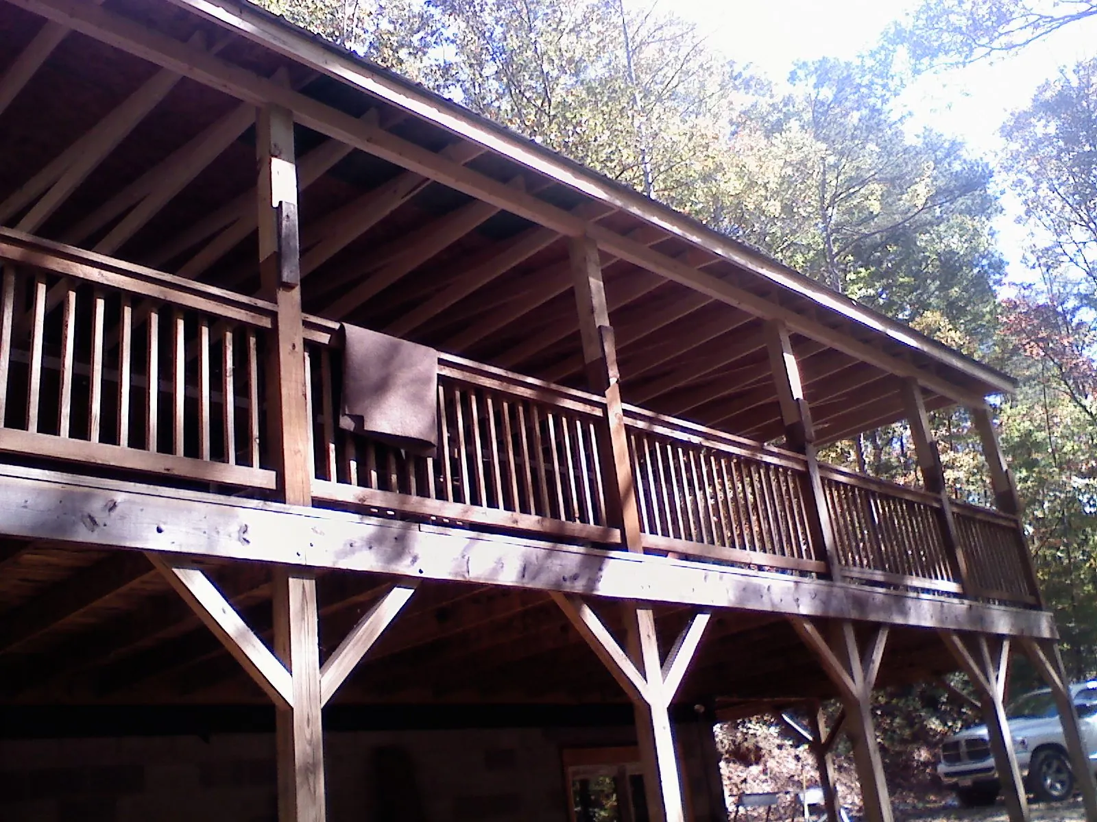 Timber framing under a new elevated porch and deck — Roof Leak Repair in West Fargo by Roofing Brothers